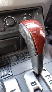 三菱 3代目(V6#/V7#) 上級グレード装着 ウッドパネル シフトノブ「SHIFTKNOB A/T」：MR580321HB