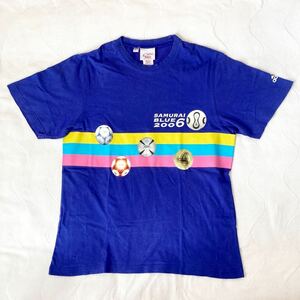 f56)キリンビール KIRIN 勝ちT 2006 サッカーボール コレクション 歴代 試合球 Adidas Tシャツ チームガイスト SAMURAI BLUE