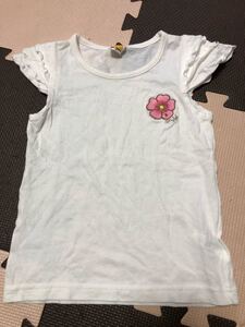 Moujonjon ムージョンジョン／半袖Tシャツ、袖フリフリ／白、花の刺繍ワッペンが可愛い／サイズ120