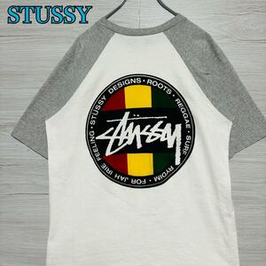 【希少デザイン】STUSSY ステューシー　Tシャツ　Lサイズ　ラグラン　ラスタロゴ　ワンポイントロゴ　ビッグロゴ　ストリート　即完売