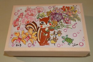 西光亭のお菓子の空箱　イラスト：ランの花束　紙製　14cm×10㎝×3.5㎝　小物入れなどに