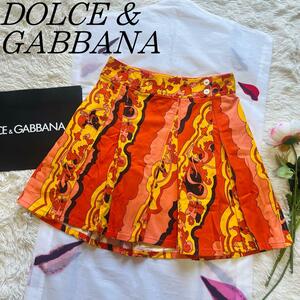 【美品】DOLCE&GABBANA 膝丈スカート 総柄 オレンジ 40 フレア ドルチェアンドガッバーナ L ボックスプリーツ 巻きスカート ラップスカート