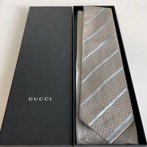 グッチ（GUCCI）シルバー水色ストライプネクタイ