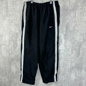 ナイキ NIKE XLサイズ パンツ ウインドブレーカー ビッグサイズ ロングパンツ ジッパー式 ランニング 普段使い トレーニング ジム USED品