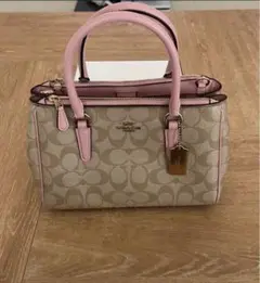 COACH シグネーチャーピンクショルダーバッグ