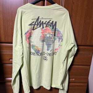 STUSSY ONE WOLRD ONE LOVE L/S tee tシャツ 黄緑　ロンt ワールドツアー　XL ショーツロゴ　