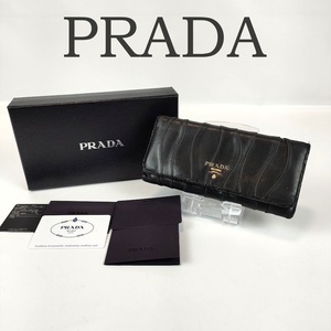 PRADA プラダ 長財布 レザー ブラック レディース 1M1132 フラップ ホック 人気 レア ヴィンテージ 羊革 中古 箱あり ナッパレザー