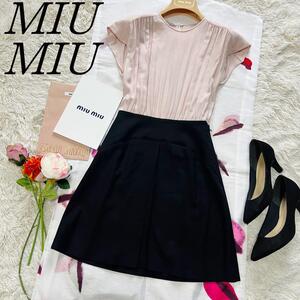 【美品】MIU MIU バイカラーワンピース 膝丈 半袖 38 ピンク ブラック　ミュウミュウ　M　ハーフスリーブ　フレア　台形スカート