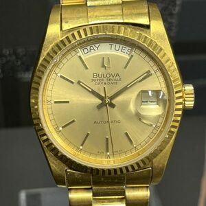 B051-Z6-303 ◎ BULOVA ブローバ 腕時計 メンズ 自動巻き デイト ゴールド フェイスサイズ約35mm 稼動品