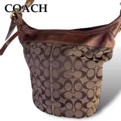 美品 COACH ショルダーバッグ バケツ型 シグネチャー ロゴ型押し 茶