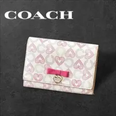 COACH 二つ折り財布 レザー フラップ ハート リボン ピンク ホワイト