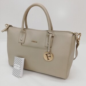 ★124 FURLA フルラ 2WAY レザー ハンドバッグ ショルダーバッグ トートバッグ ロゴチャーム付き 鞄 かばん カバン バッグ ベージュ系