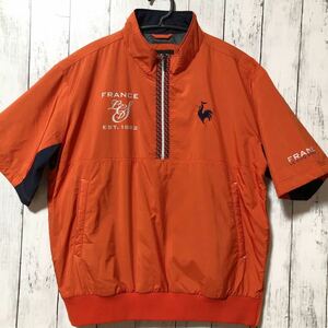 【le coq sportif golf】ルコックゴルフ 半袖ハーフジップ ジャケット メンズ M 中わた オレンジ×ネイビー