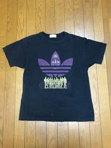 レア ビンテージ 90s デサント adidas アディダス Tシャツ M-L 黒x紫x金 ゴールド 90年代 オールド vinatage 人影 顔 トレフォイル ロゴ