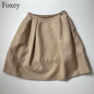 美品 FOXEY BOUTIQUEフォクシーブティックフレアスカート シルクスカート ベルフラワー　膝丈 ロゴプレート　40レディース