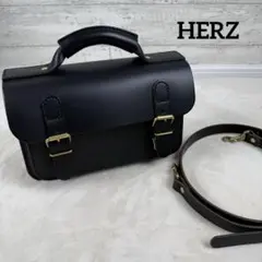 HERZ ヘルツ 二本ベルトの2wayミニバッグ 美品 レザーショルダーバッグ