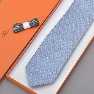 未使用 HERMES エルメス イルカ柄 ネクタイ シルク 水色 ライトブルー 箱付き 606016T スーツ フォーマル 制服 ブランド Mk.f/a.c