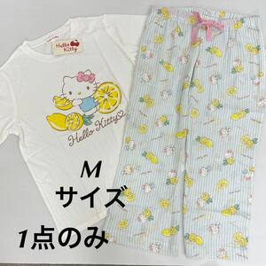 新品17979 ハローキティ　サイズM Ｔスーツ 半袖パジャマ　上下セット　アイボリー×ブルー　Ｔシャツ＋ロングパンツ部屋着ルームウェア