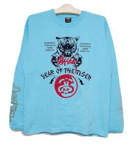 爆レア希少！新品タグ付き！STUSSY ステューシー/２０１０干支記念品！寅年限定！イヤーオブザタイガー長袖ロングスリーブＴシャツ M 水色