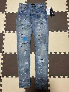 AMIRI ALL OVER REPAIR JEAN INDIGO