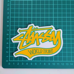 ステューシー ステッカー WORLD TRIBE イエロー 正規品 送料無料!! 匿名配送 追跡可能 STUSSY Stussy stussy 黄色