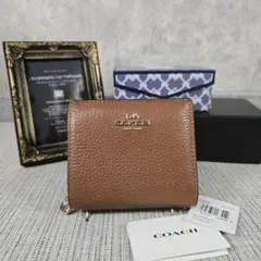 新品　未使用　COACH　二つ折り財布　折り財布　コンパクトウォレット