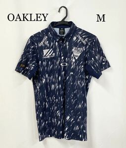 0297 OAKLEY GOLF 半袖ポロシャツ Mサイズ ロゴ刺繍 総柄