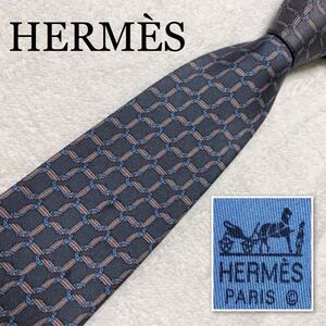 HERMES エルメス　ネクタイ　格子　紐　馬蹄　ホースシュー　シルク100% フランス製　ブルー系グレー　ビジネス