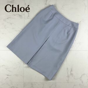 美品 miss chloe ミスクロエ センタータックフレアスカート バックジップ 膝丈 裏地あり 水色 サイズ40*HC1035