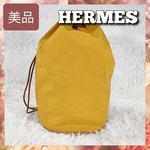 【美品】1円～ HERMES エルメス ポロション ミミル GM 巾着 ショルダーバッグ リュック イエロー 黄色 キャンバス 軽量 メンズ レディース