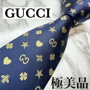 極美品 現行タグ レア GUCCI ネクタイ シルク100% 総柄 蜂 GGロゴ 星 ハート ソーホー ナロータイ ブランドロゴ 刺繍 ネイビー