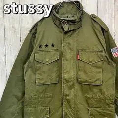 stussy ステューシー ミリタリージャケット ワッペンロゴ プリントロゴ