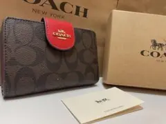 46 新品未使用 coach コーチ 二つ折り財布 シグネチャー