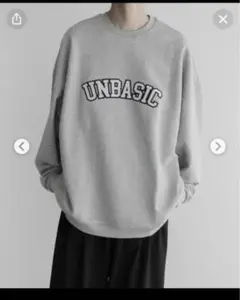 remer loose UNBASIC logo over sweat