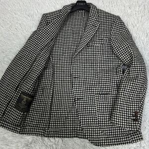 美品 【100周年 ハリスツイード】HARRIS TWEED ユニバーサルランゲージ テーラードジャケット シングル 千鳥 総柄 近年 黒タグ 限定 毛 AW