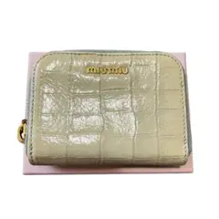 新品未使用品 MIU MIU 型押し エナメル ラウンドジップ コインケース