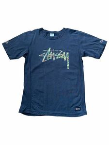 ●●STUSSY x Champion ステューシー チャンピオン 迷彩ウッドランドカモ ビッグロゴ リバース T L 黒ブラック●●