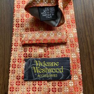 Vivienne Westwood（ヴィヴィアンウエストウッド）オレンジミニ丸バツ柄ネクタイ