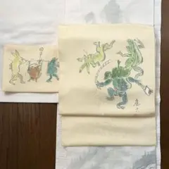 水墨画家 田中應吉 砥粉色塩瀬手描き おとなの鳥獣戯画図柄 九寸名古屋帯 作家物