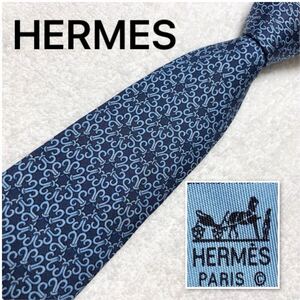 ■美品■HERMES エルメス　ネクタイ　金具風　総柄　シルク100% フランス製　ブルー系　ビジネス