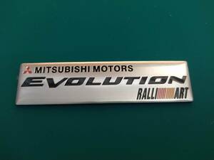 【ゆうパケット送料込】MITSUBISHI MOTORS EVOLUTION　エンブレムプレート　縦2.5cm×横10.2cm×厚さ1ｍｍ 三菱　ラリーアート