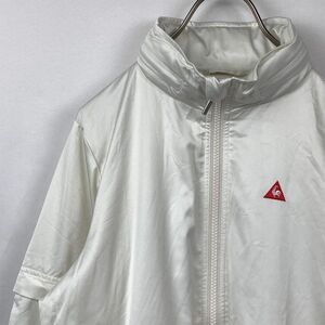 le coq sportif バランタイン選手権 ナイロンジャケット Sサイズ オフホワイト ルコックスポルティフ ゴルフ レディース バック刺繍