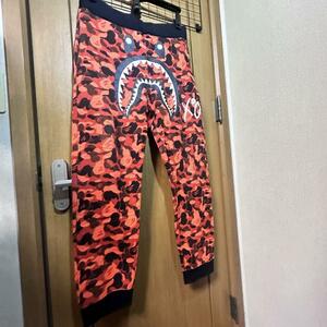 Bape XO orange camo track pants