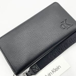 カルバンクライン【新品 未使用】長財布 黒 ラウンドジップ ストラップ Calvin Klein ロングウォレット wallet ロゴ