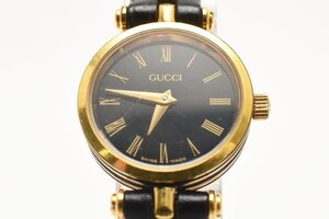 グッチ ラウンド ゴールド ブラック文字盤 レディース クォーツ 腕時計 GUCCI