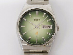 ♪hayy2937-1 506 SEIKO セイコー ELNIX エルニクス 0703-8030 緑文字盤 QZ デイデイト メンズウォッチ 腕時計 腕周り約16.5cm 電池未交換