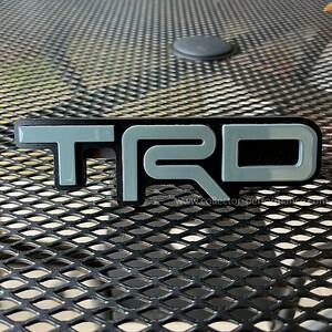 Taco Vinyl/タコビニール TRD グリルバッジ ルナロック