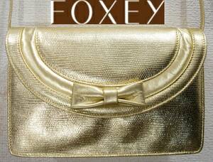 送料510円~(即決は送料無料) FOXEYリザード型押しレザーポシェット ショルダー付きクラッチバッグITALYゴールド 金色リボン フォクシー