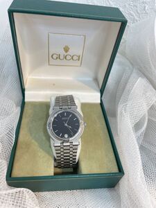 GUCCI 腕時計 9100M レディース　ボーイズ　メンズ　黒　銀　ブラック　シルバー　備品　箱付き　グッチ　ステンレススチール　日付