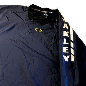 美品☆OAKLEY/オークリー☆サイドジップ☆ウインドブレーカー☆裏地メッシュ/軽量/ジャケット/ジャージ/ゴルフ/野球/紺/大きめサイズ/2XL